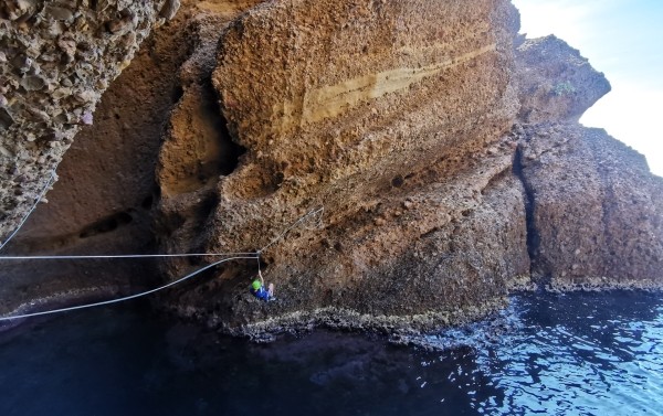 Tyrolean traverse in the calanque of Mugel in La Ciotat